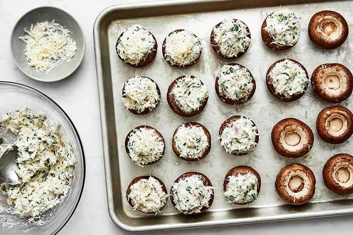 Prepping crab stuffed mushrooms