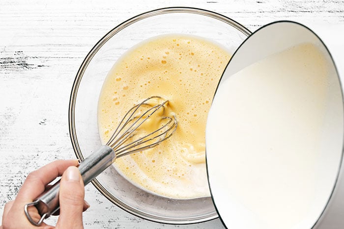 Whisking egg mixture in bowl