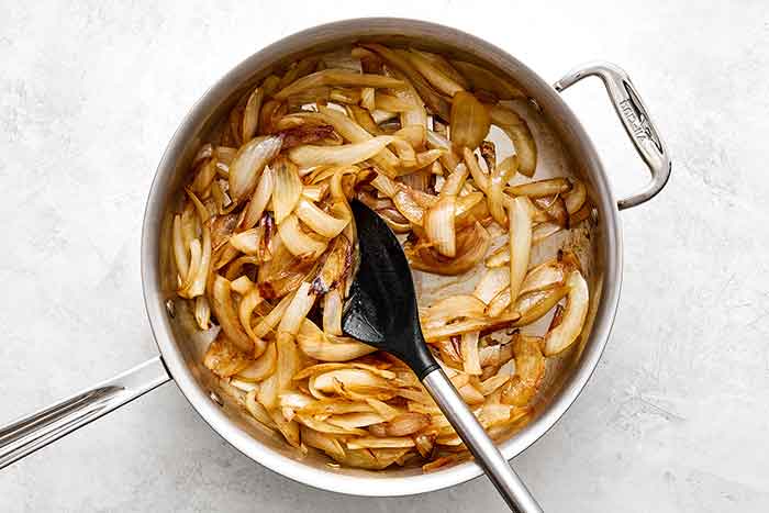 Step two of French onion dip: keep caramelizing onions.