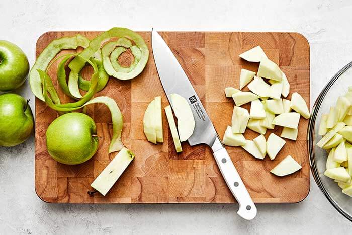 Peeling and slicing apples.