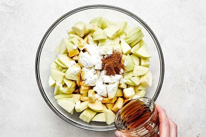 Apple crisp filling in a bowl.
