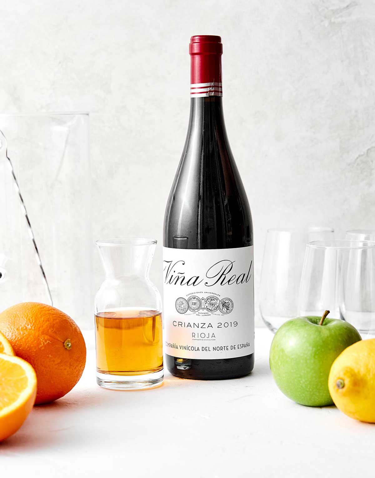 A pitcher of this red sangria feels is the perfect cocktail for a crowd! All you need is Spanish red wine, brandy, and fresh fruit. Red sangria ingredients.