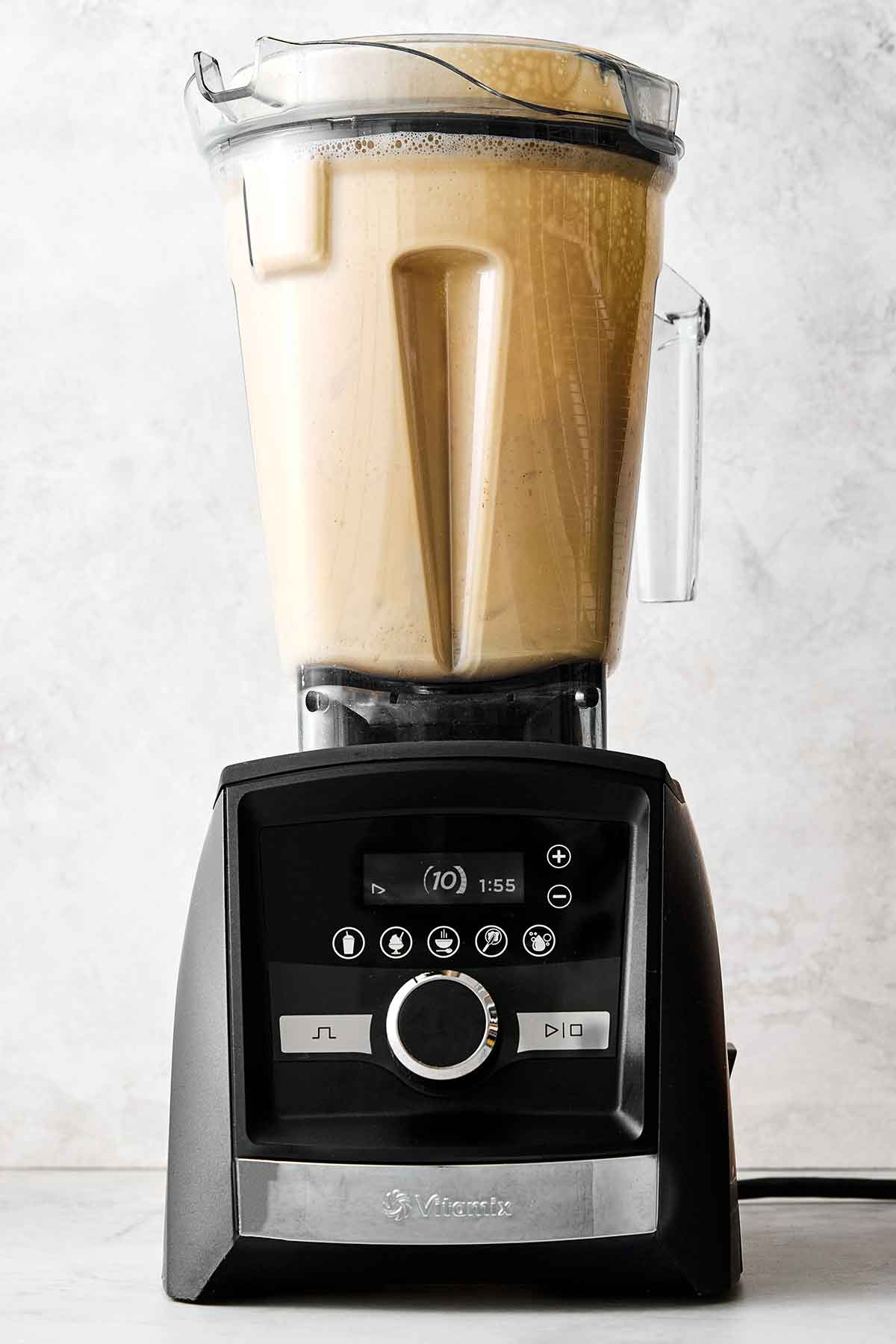 Step one of making eggnog: tempering eggs in a blender.