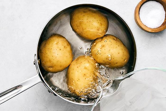 A pot of boiled potatoes.