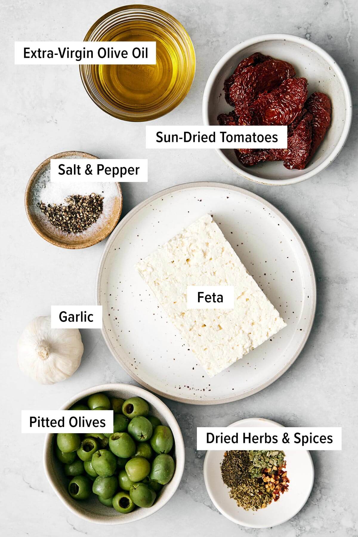 This Mediterranean baked feta with an herb-infused olive and sundried tomato topping is officially my signature appetizer for dinner parties. Mediterranean baked feta ingredients.