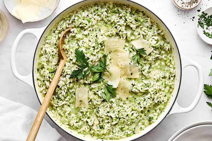 A white pot of broccoli parmesan risotto.