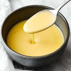 A spoonful of beurre blanc sauce.