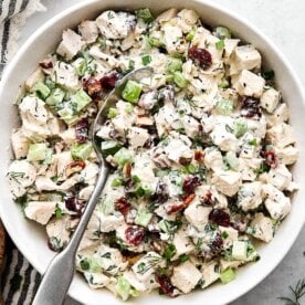 Turkey salad in a white bowl.