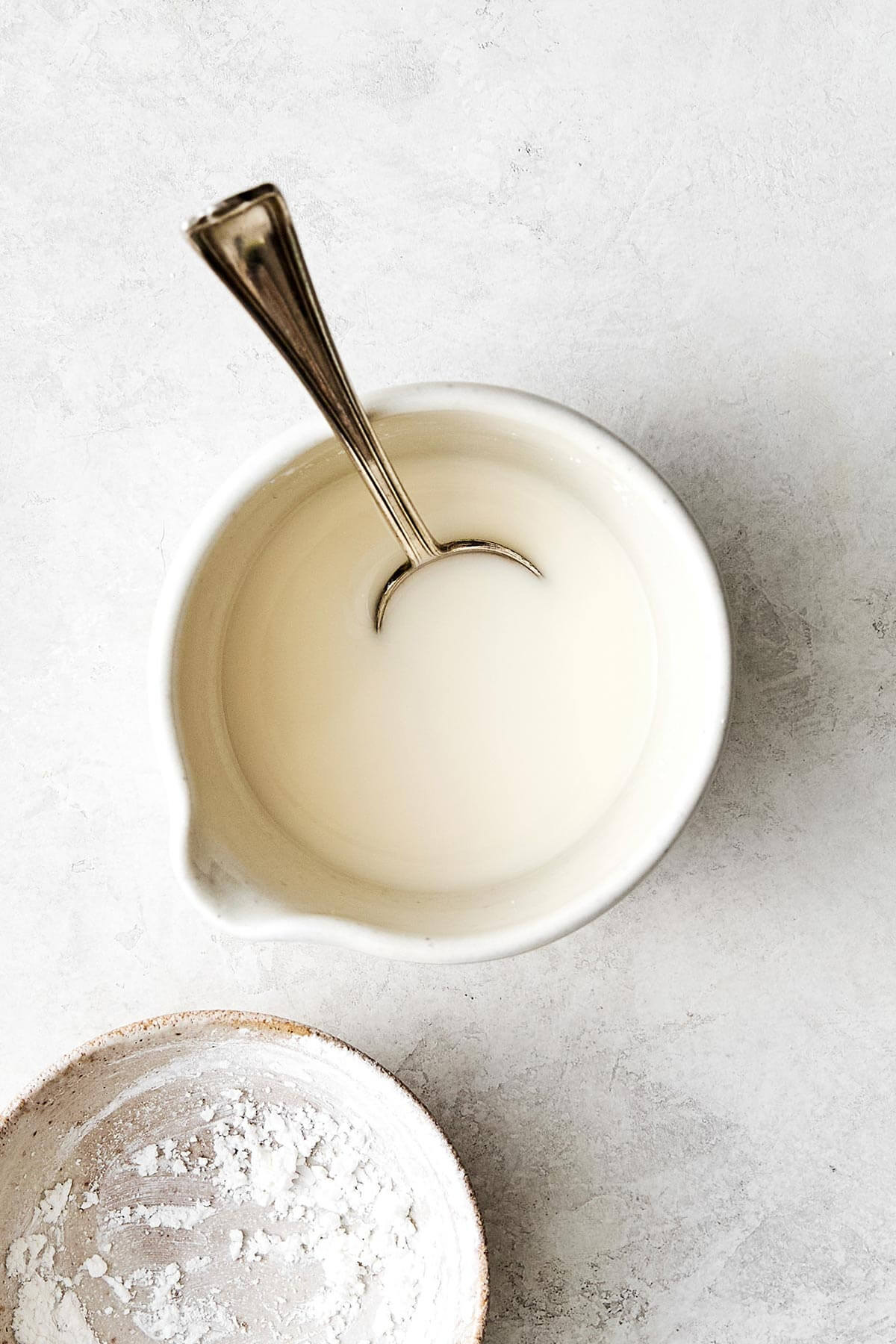 Making slurry for egg drop soup.