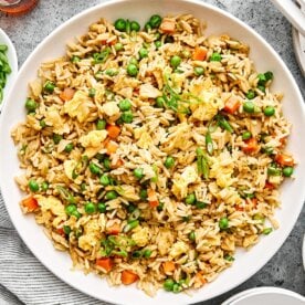 Fried rice in a white bowl.