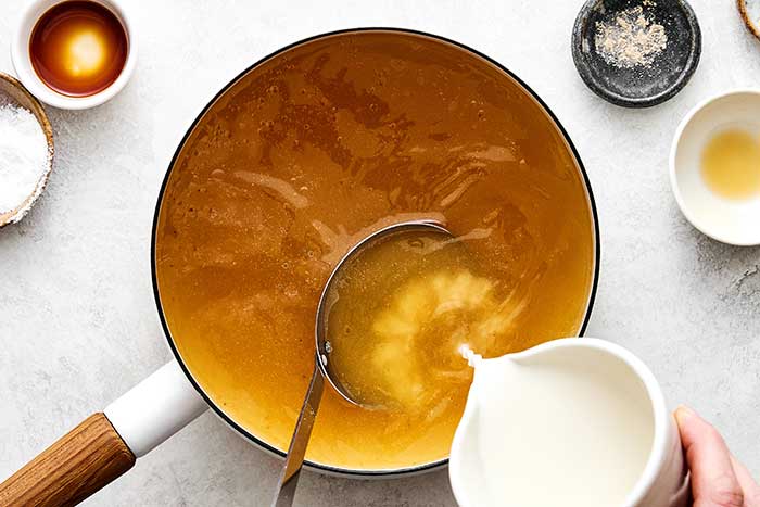 A pot of soup with slurry.