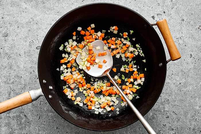Cooking vegetables in a wok.