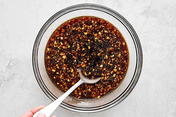 Mongolian beef sauce in a glass bowl.