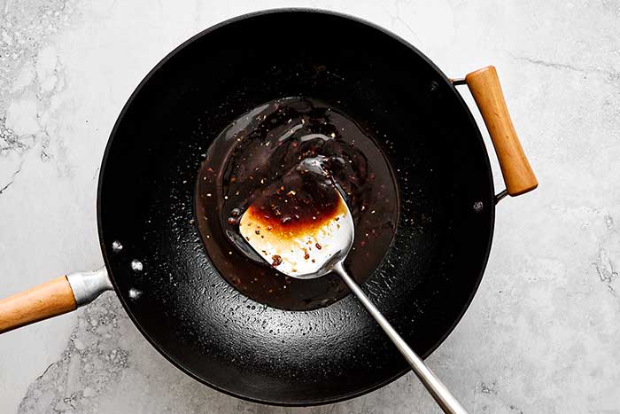 Beef sauce in a wok.