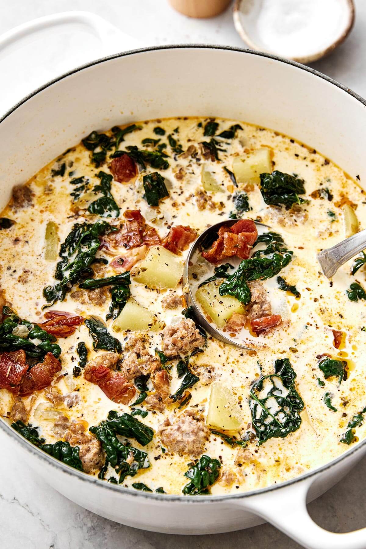 A large pot of Zuppa Toscana soup.