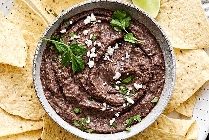 Creamy black bean dip in a bowl.