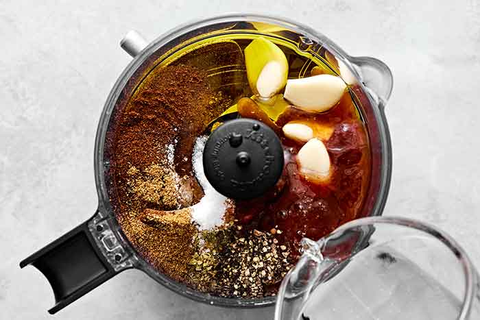 Chipotle sauce for chicken in a food processor.