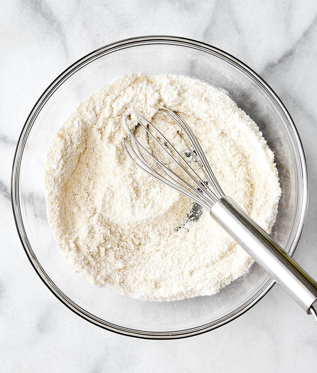 Mixing dry ingredients for protein pancakes.