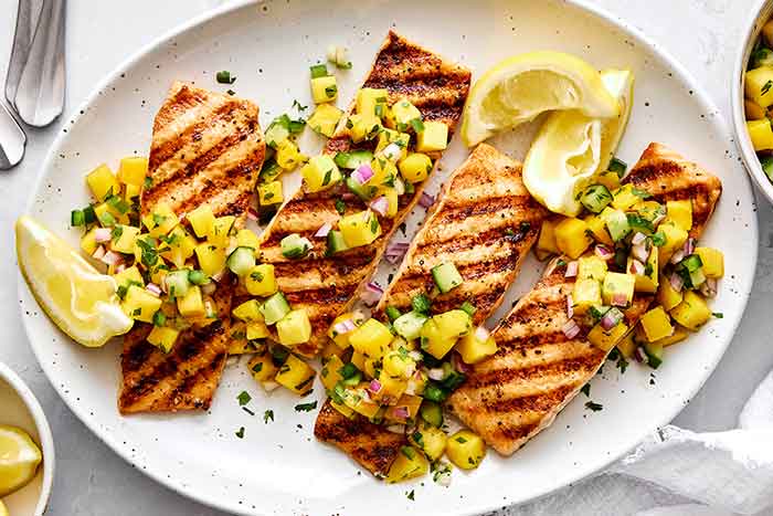 How to grill salmon with mango salsa.