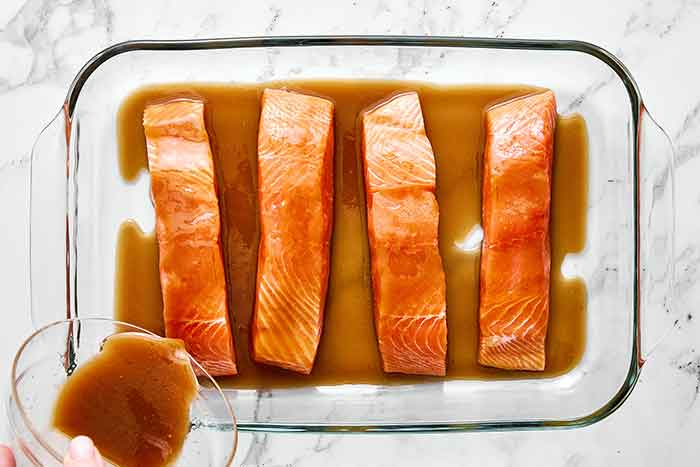 Marinating salmon in miso sauce.
