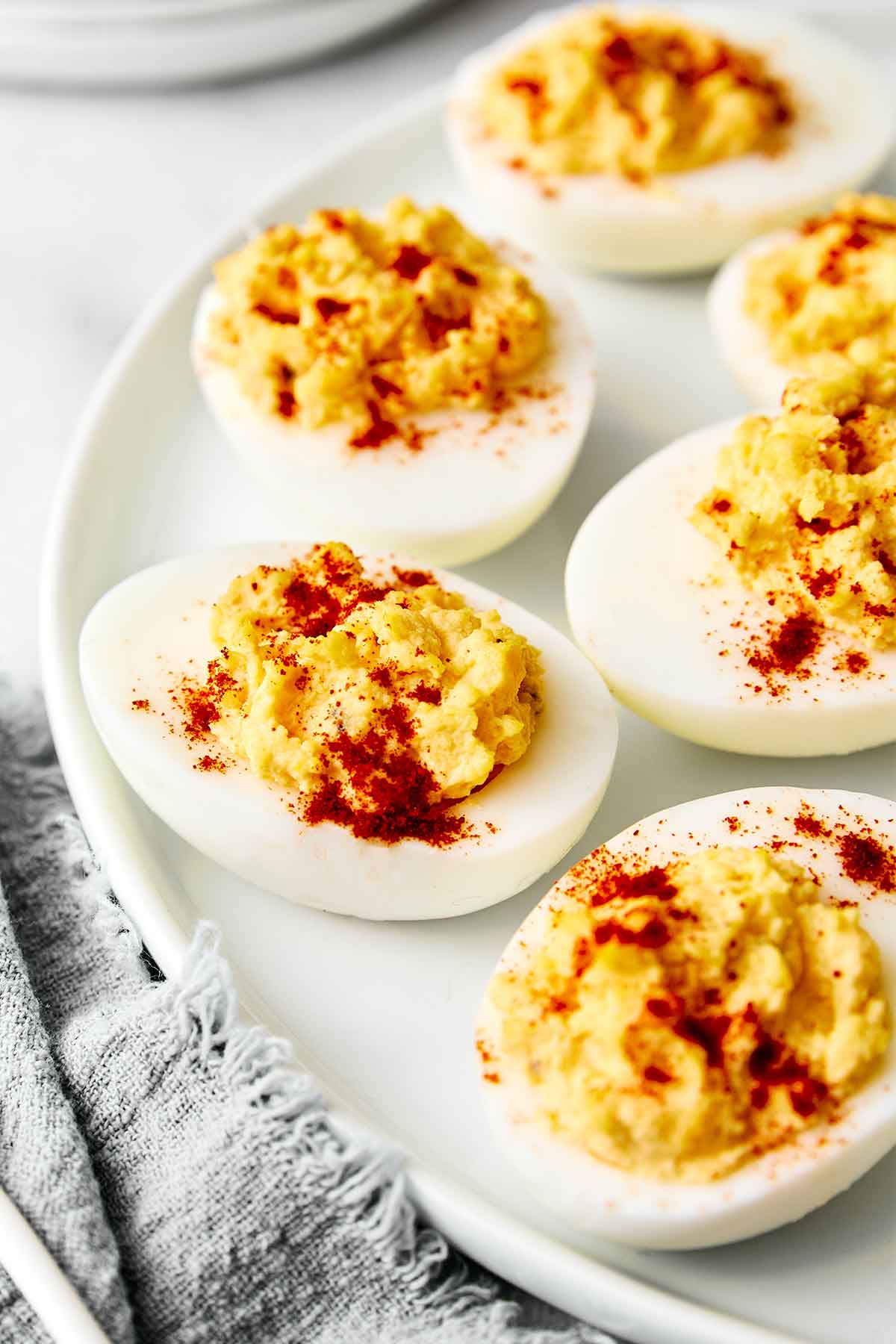 Deviled eggs on a serving platter.