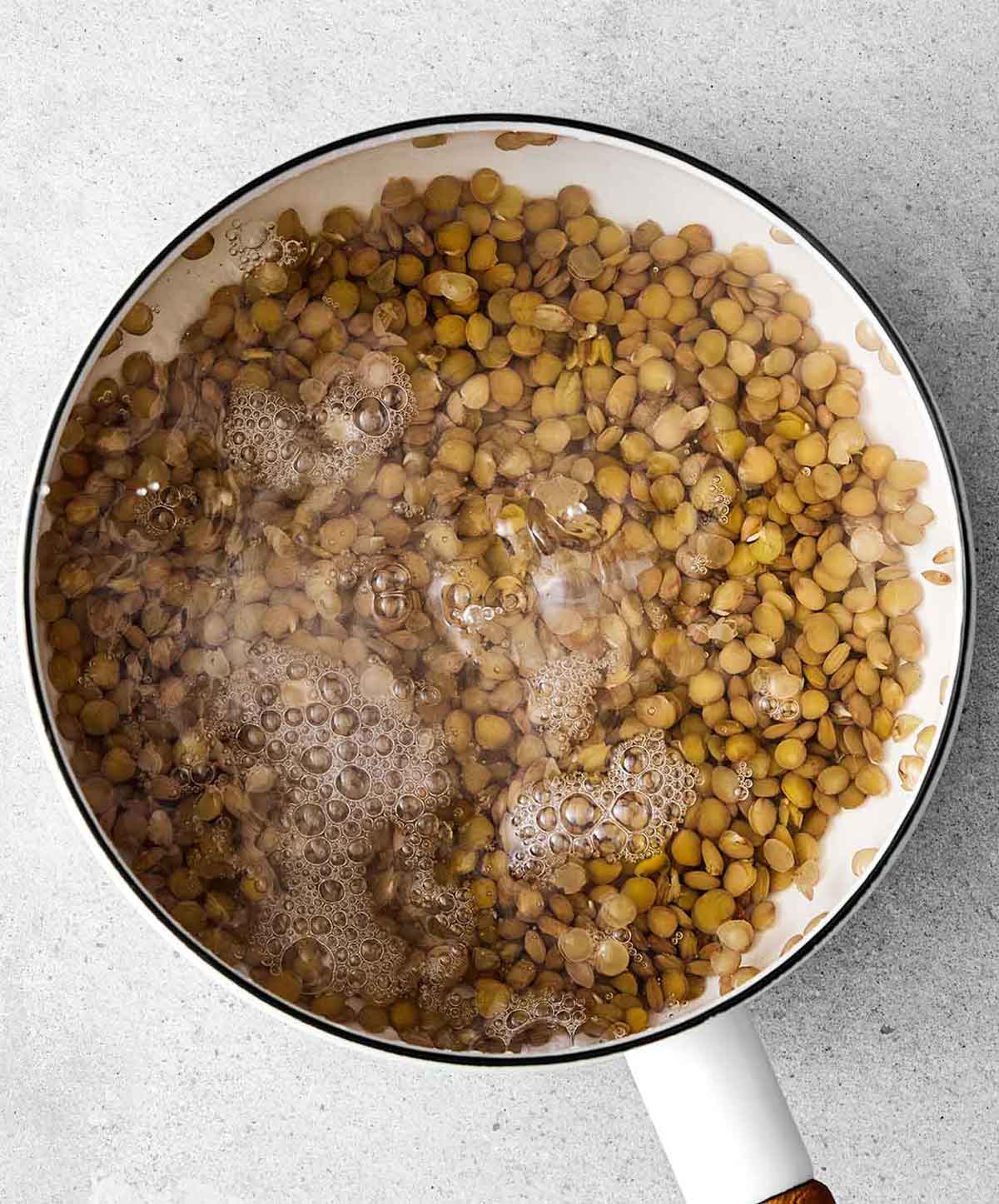 Step three of making a sweet potato salad: cook the lentils.