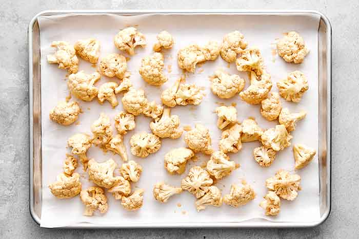 Step two of buffalo cauliflower: bake the cauliflower.