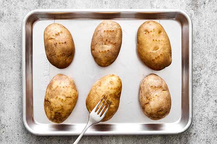 Step one of potato skins: Bake the potatoes.