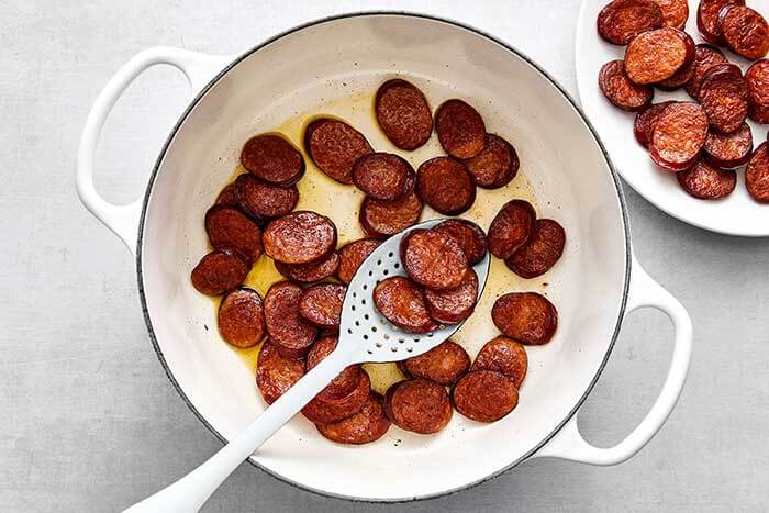 Step two of red beans and rice: cook the sausage.