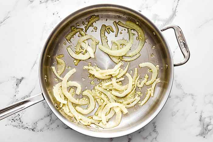 Step one of spinach and white bean salad: cook the fennel.