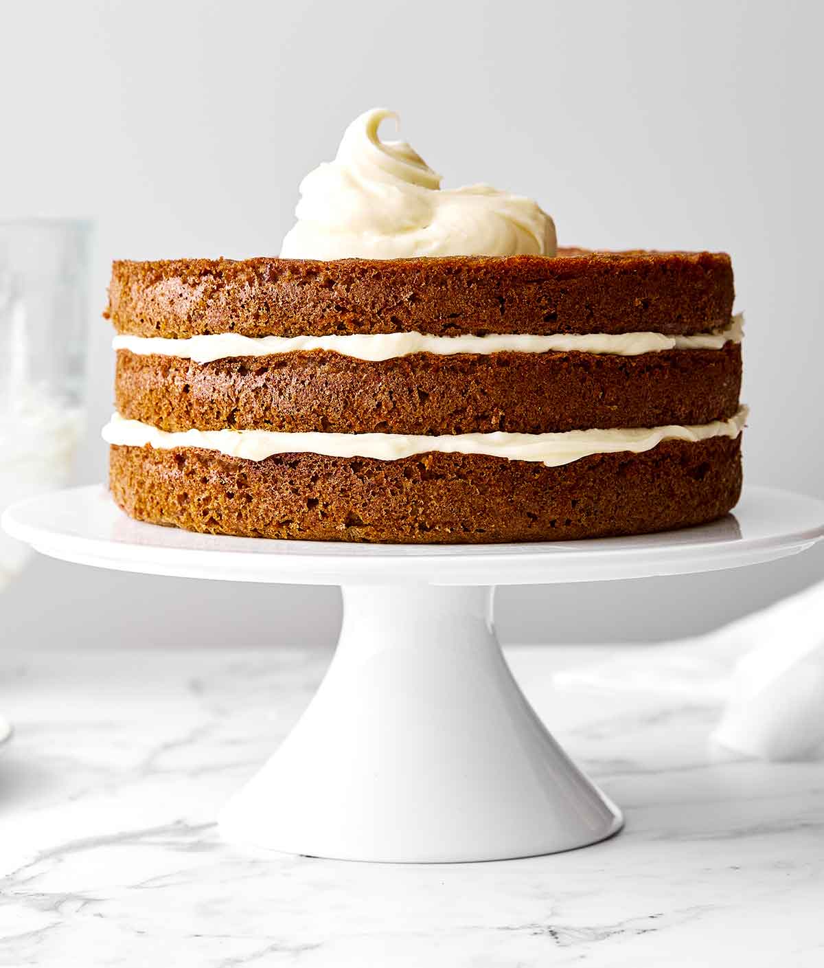 Step five of carrot cake: Layer the cake.