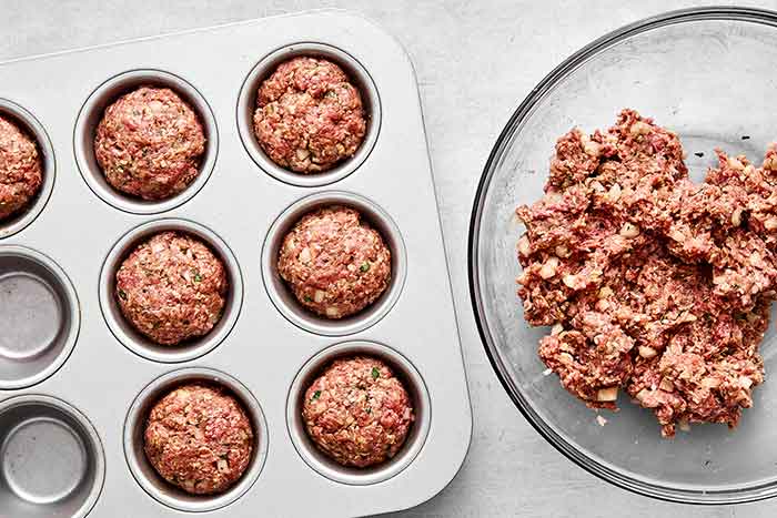 Step two of meatloaf muffins: form muffins.