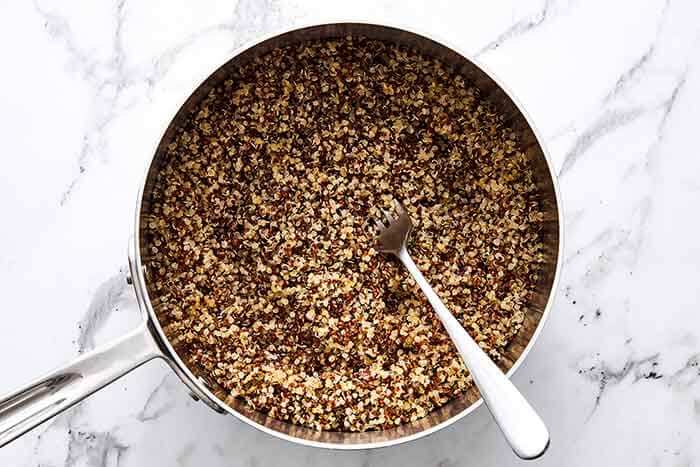 Cooking quinoa in a pot.
